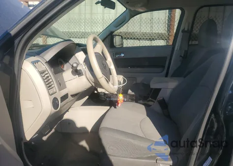 2009 Mazda Tribute Hybrid z USA, uszkodzony, nr VIN 4F2CZ49319KM07138